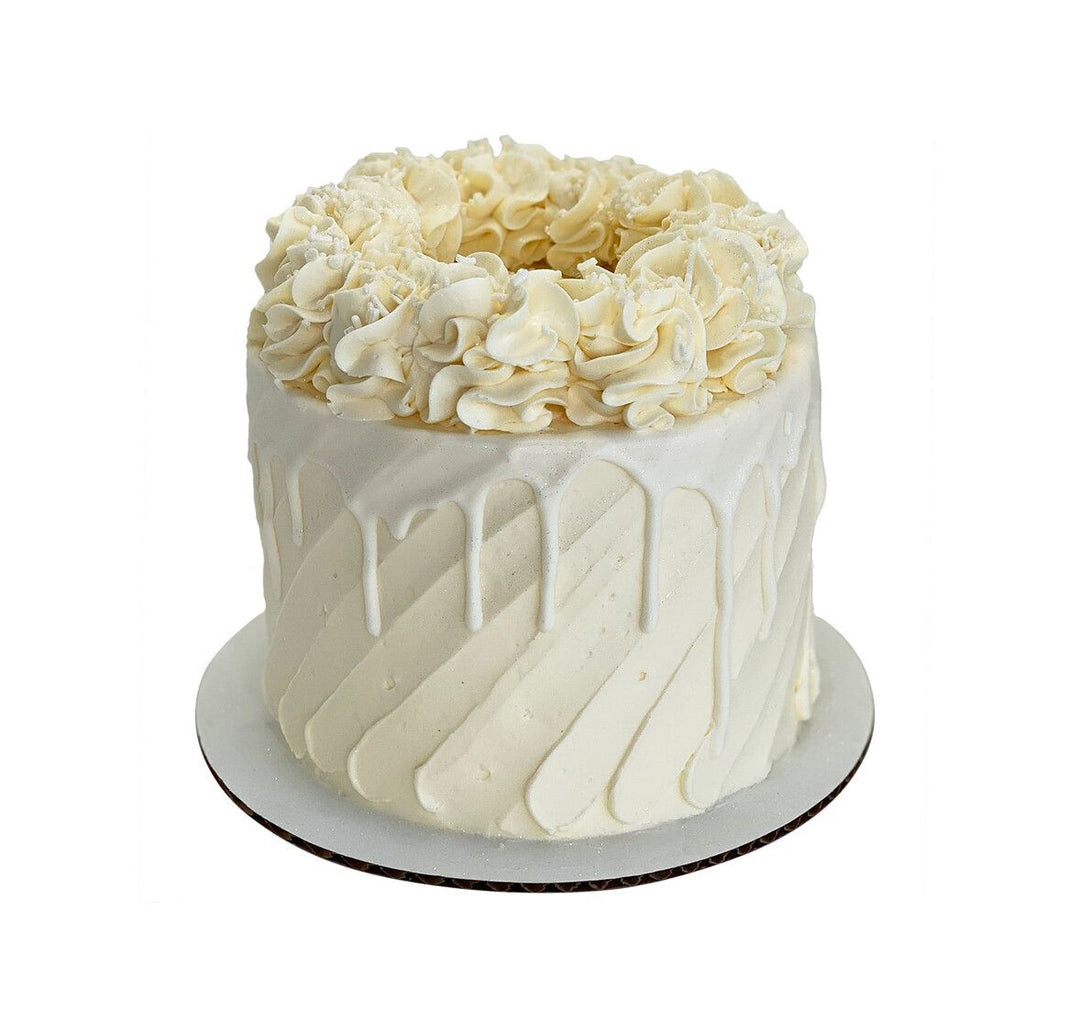 Signature Vanilla Drips Cake