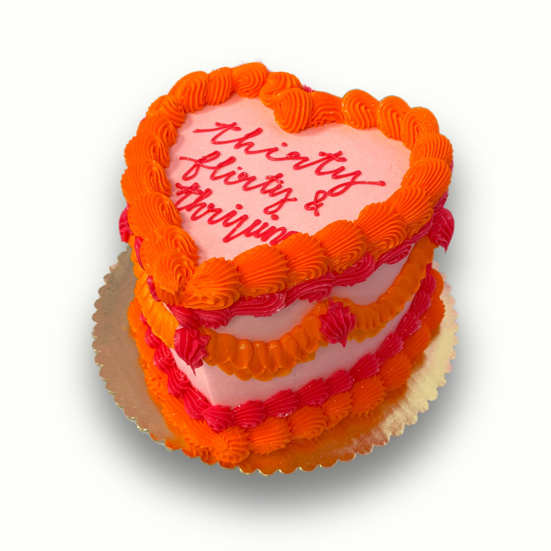 Thirty, Flirty, and Thriving Heart Piping Cake