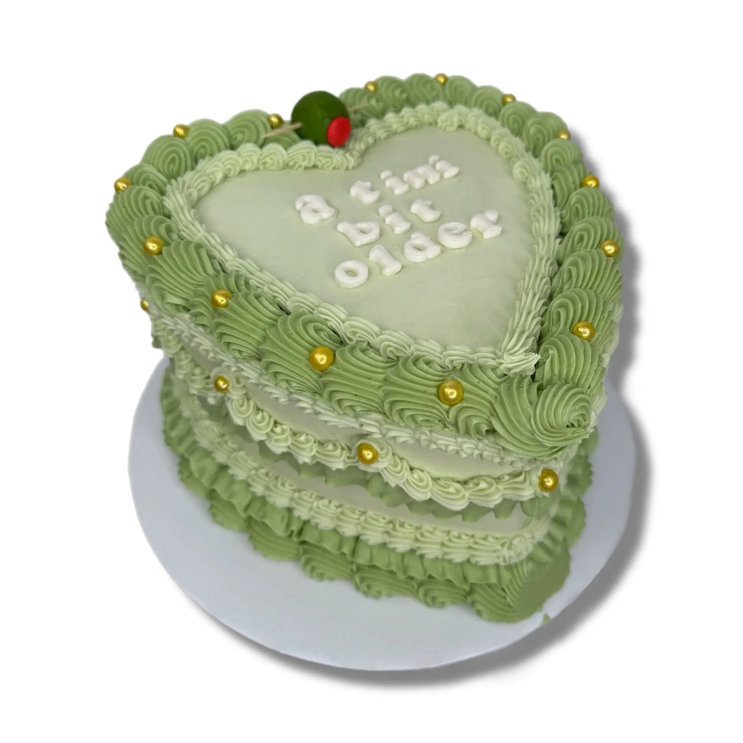 a tini bit older heart cake That's The Cake Bakery