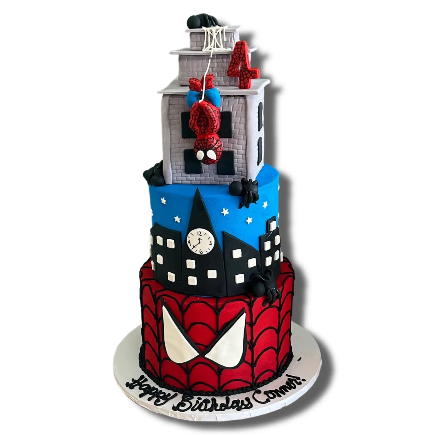 Spiderman Hanging from Building That's The Cake Bakery